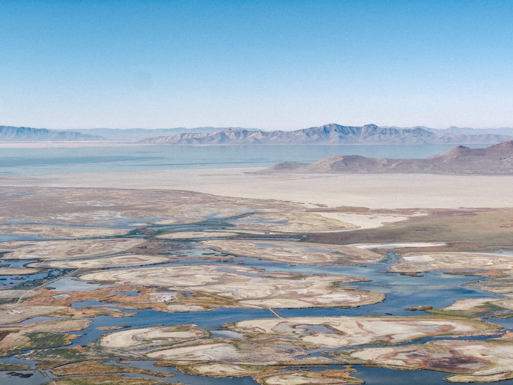 a large body of water surrounded by mountains