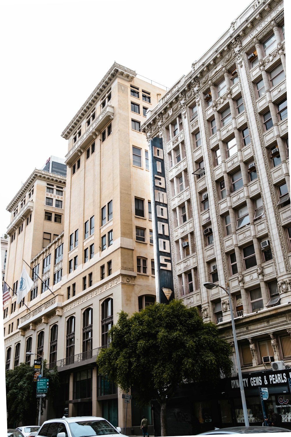 a city street filled with lots of tall buildings