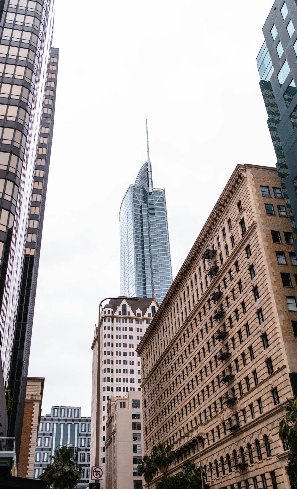 a group of tall buildings in a city