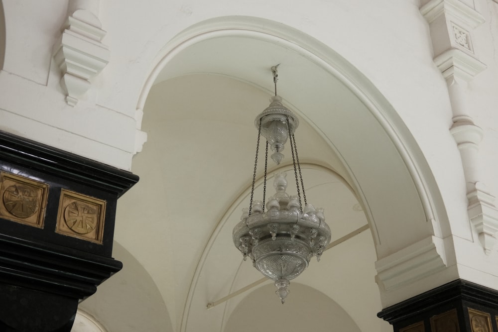 a chandelier hanging from the ceiling of a building