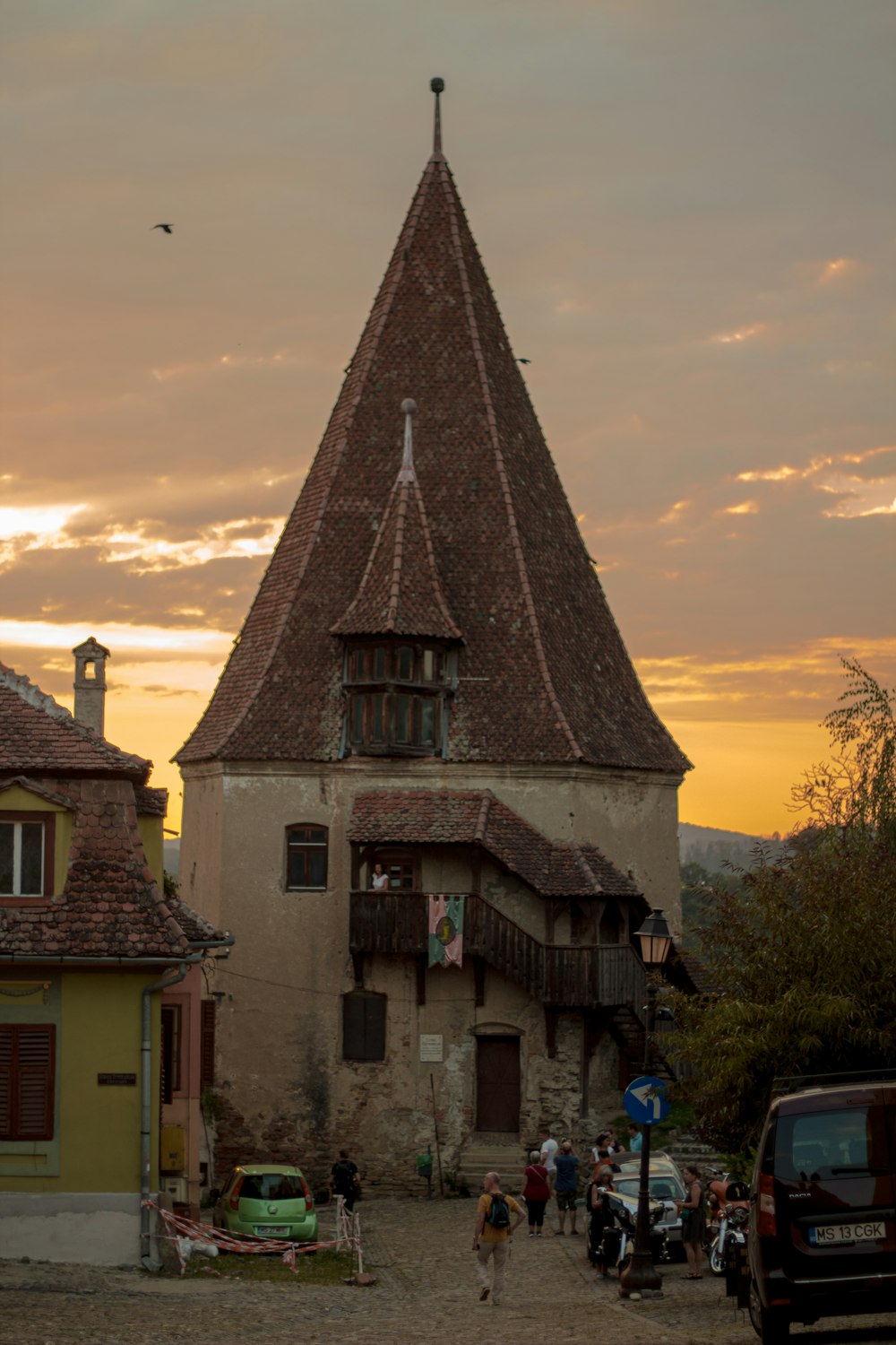 an old building with a tower with a clock on it