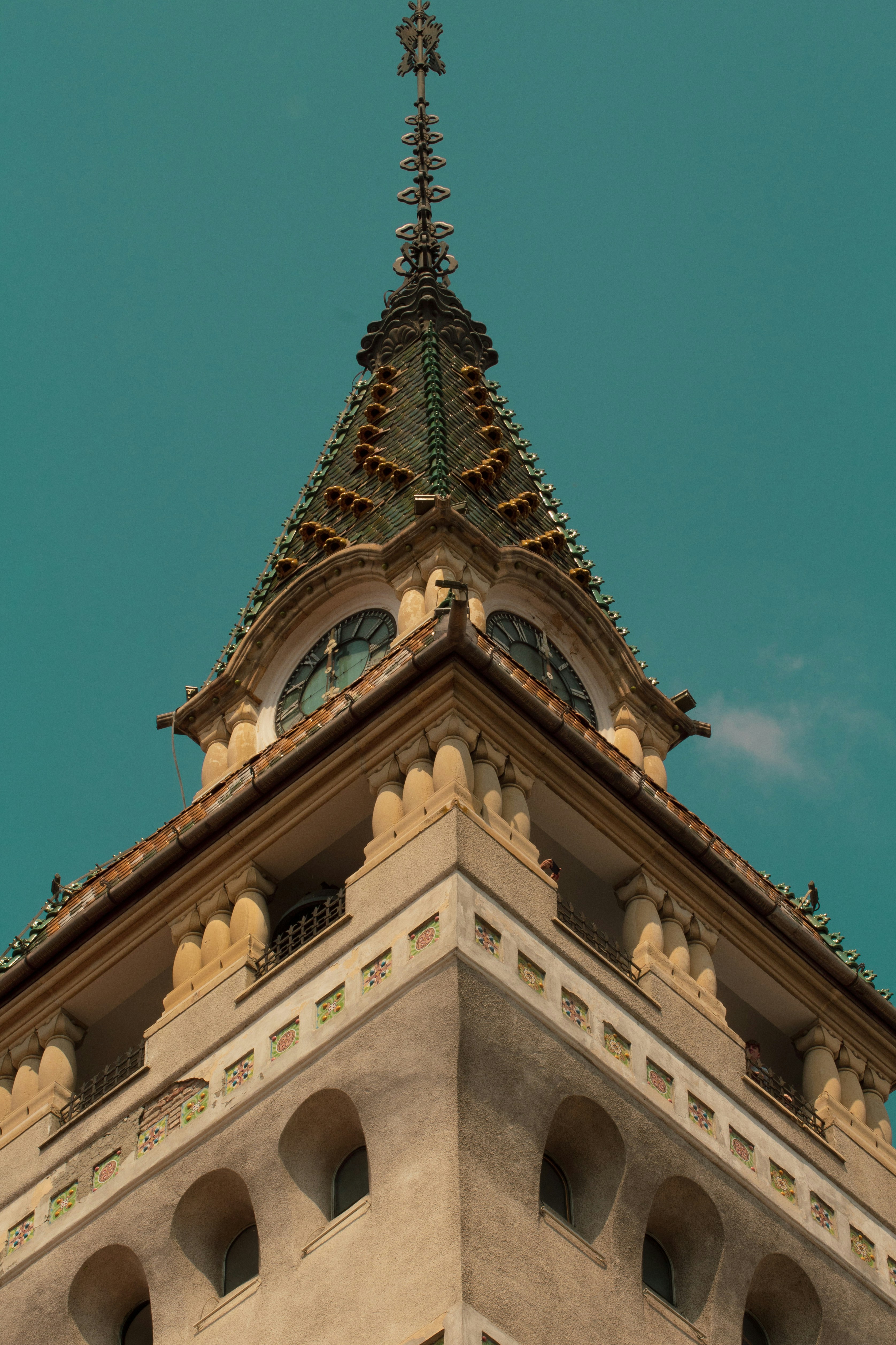 a tall building with a clock on the top of it