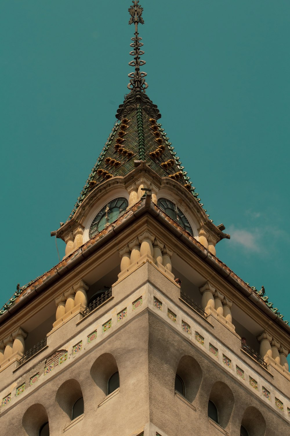 a tall building with a clock on the top of it