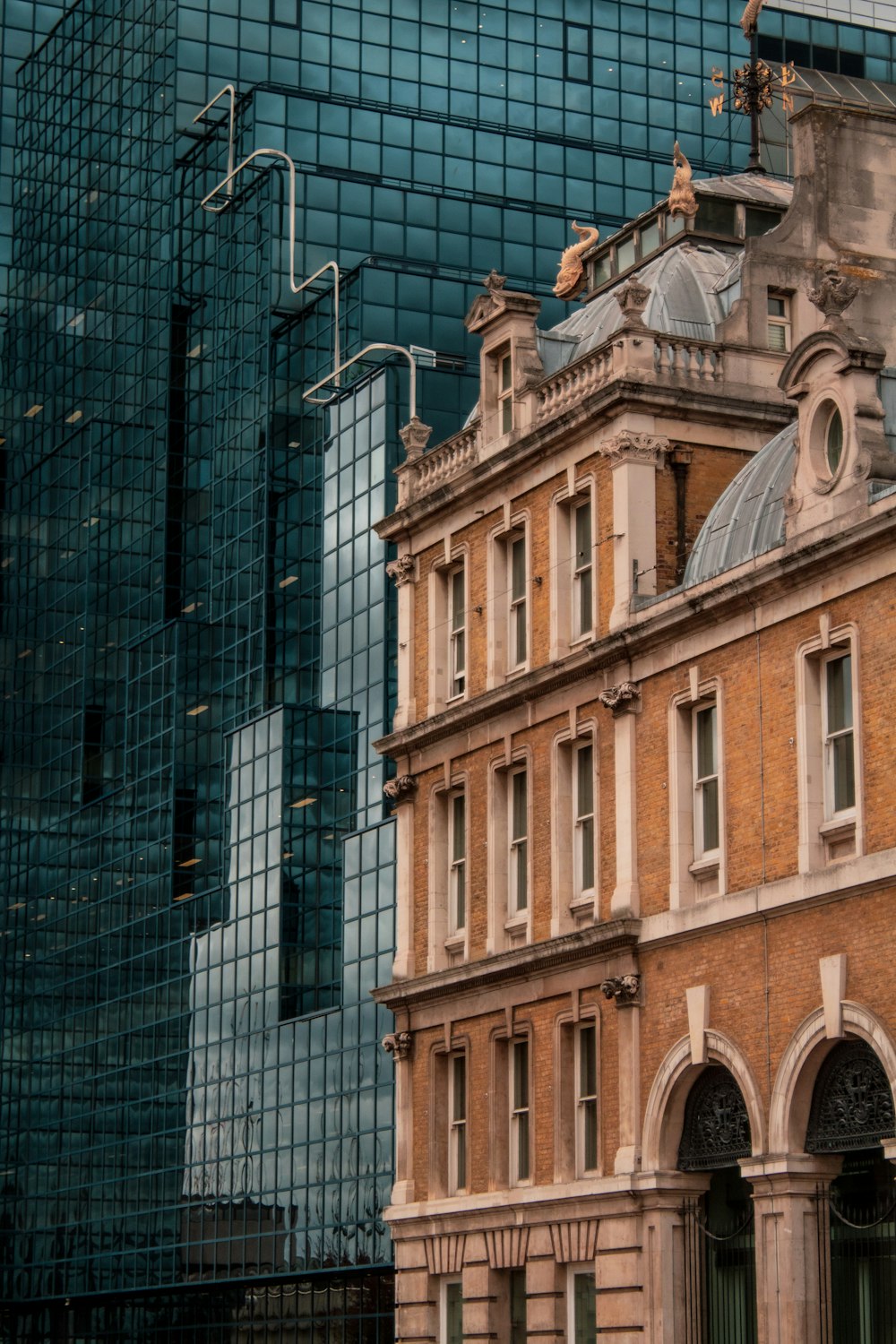 a tall building with a clock on the top of it