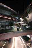 Infrastructure project with smooth roads and elegant street lighting under a clear sky.