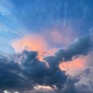 Vibrant weather app showing animated sun and clouds with easy-to-read temperature.