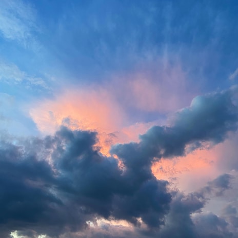 Vibrant weather app showing animated sun and clouds with easy-to-read temperature.