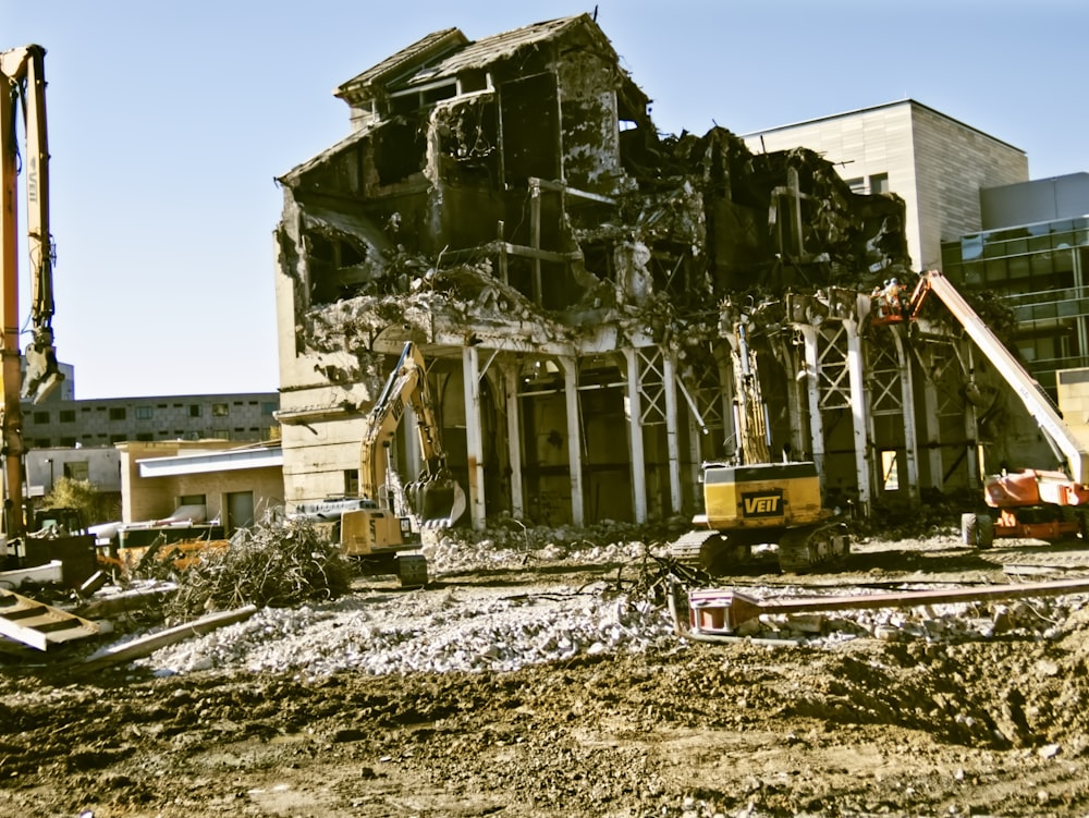 a large building with a crane in front of it