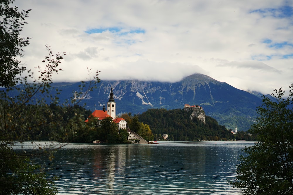 a church on a small island in the middle of a lake