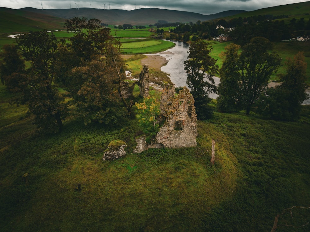 an aerial view of a castle in the middle of a field