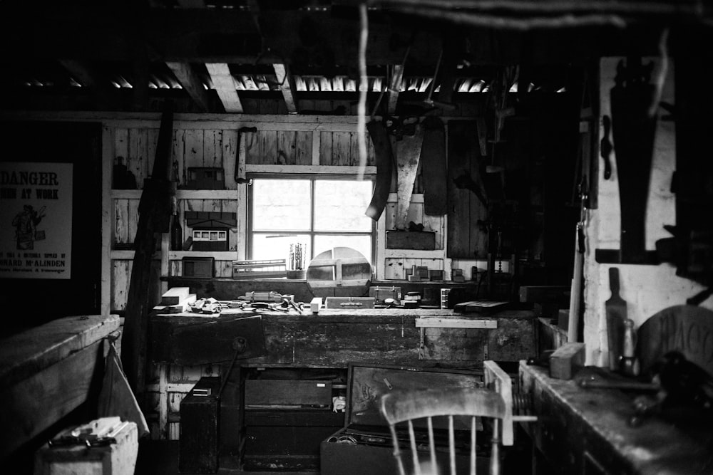 a black and white photo of a kitchen