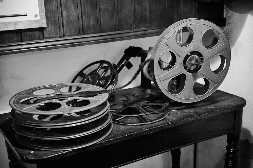 a black and white photo of old movie reels