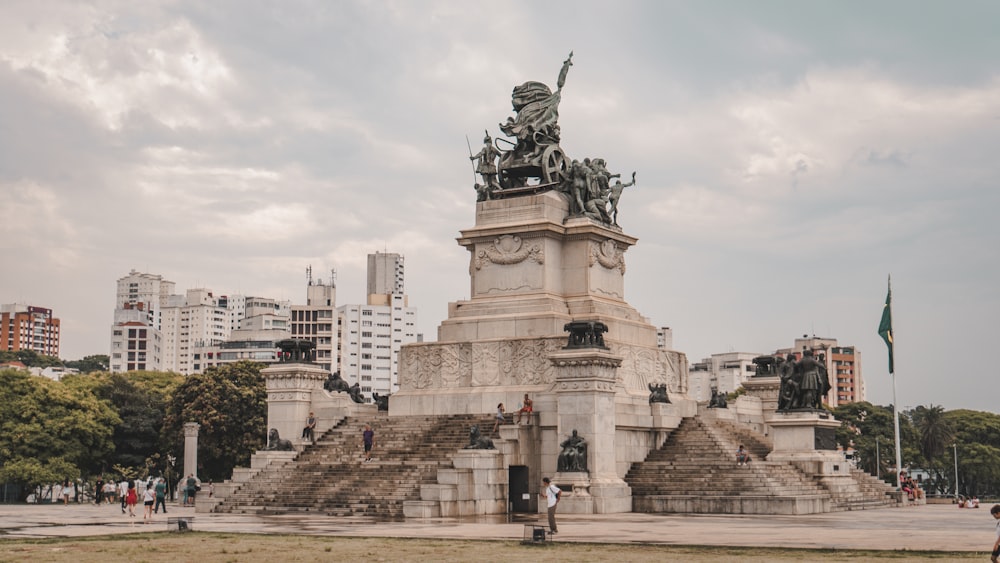 a statue of a man on a horse in a park