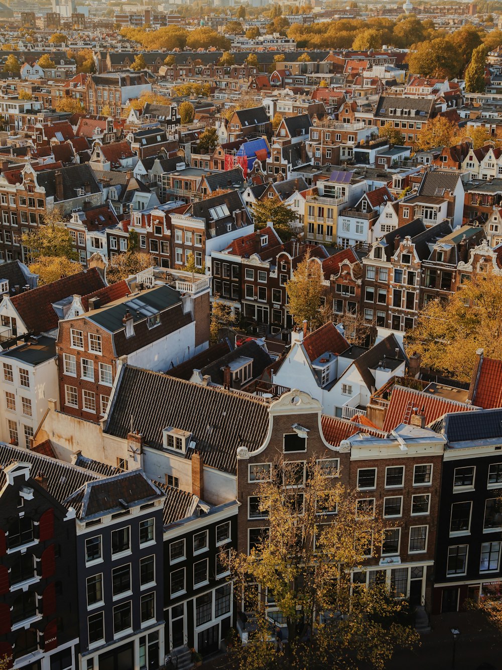 an aerial view of a city with lots of tall buildings