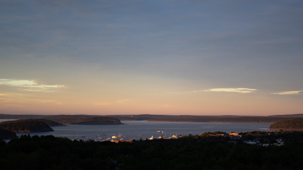 a view of a body of water at sunset