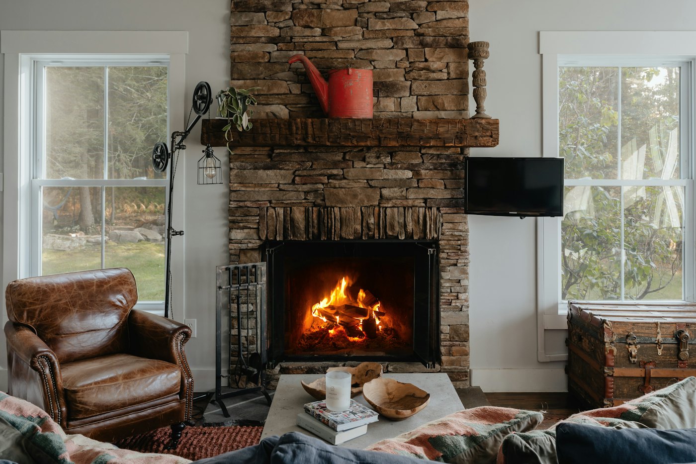 Living room with a brick fireplace