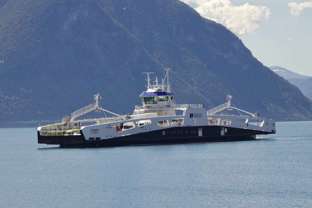 a large boat floating on top of a large body of water