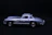 Close-up of a gleaming diecast car prize with metallic silver and red accents on a dark background.