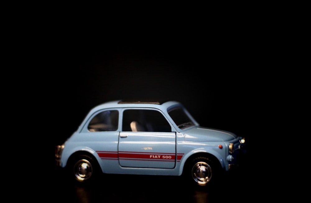 a toy car is shown in the dark