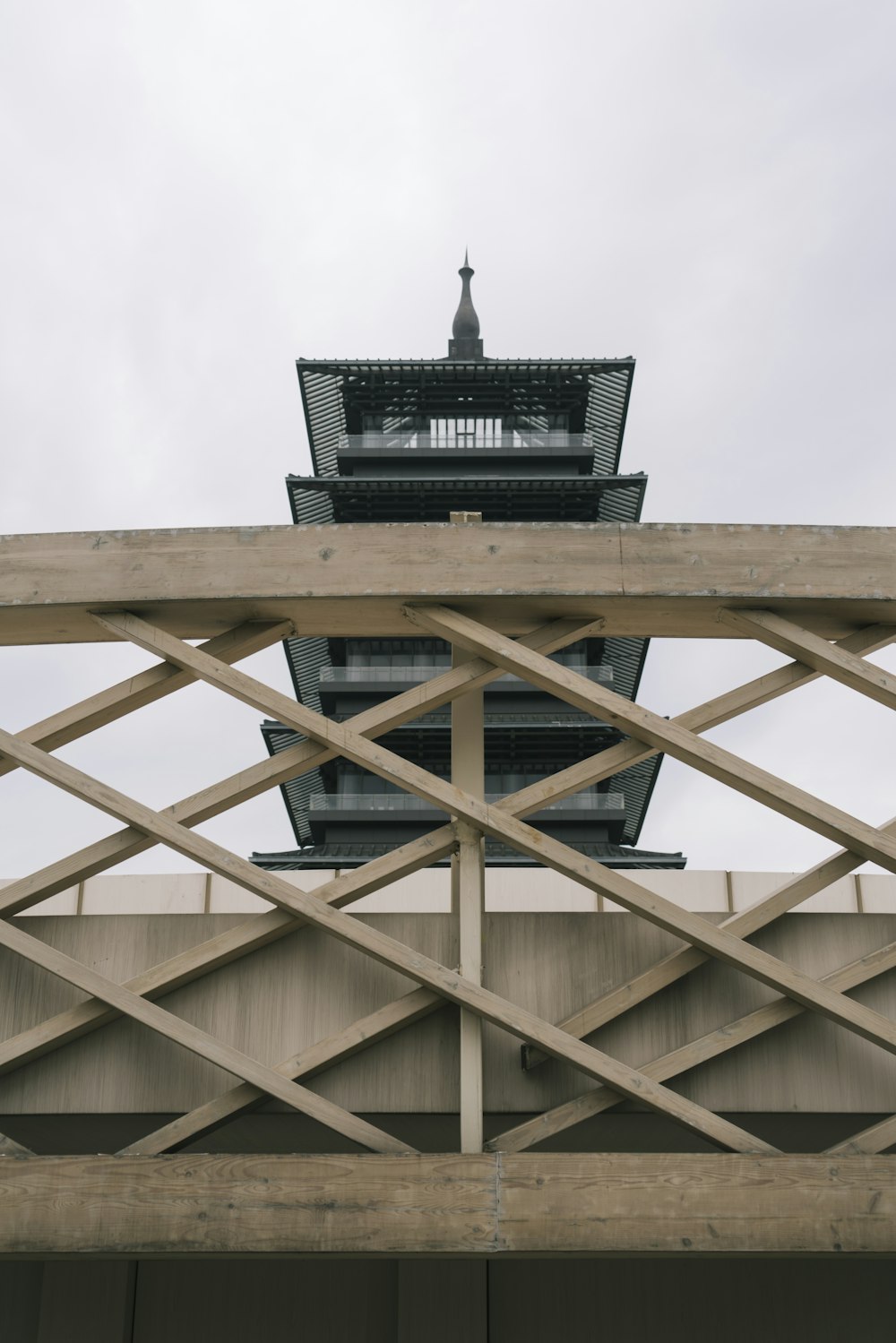 a clock tower on top of a bridge