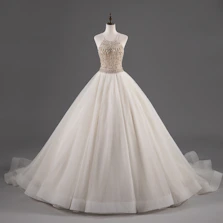 Elegant quinceañera dress displayed on a mannequin with delicate embroidery.