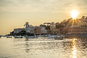 Sunset view over the historic old town of Cádiz with golden light reflecting on the sea