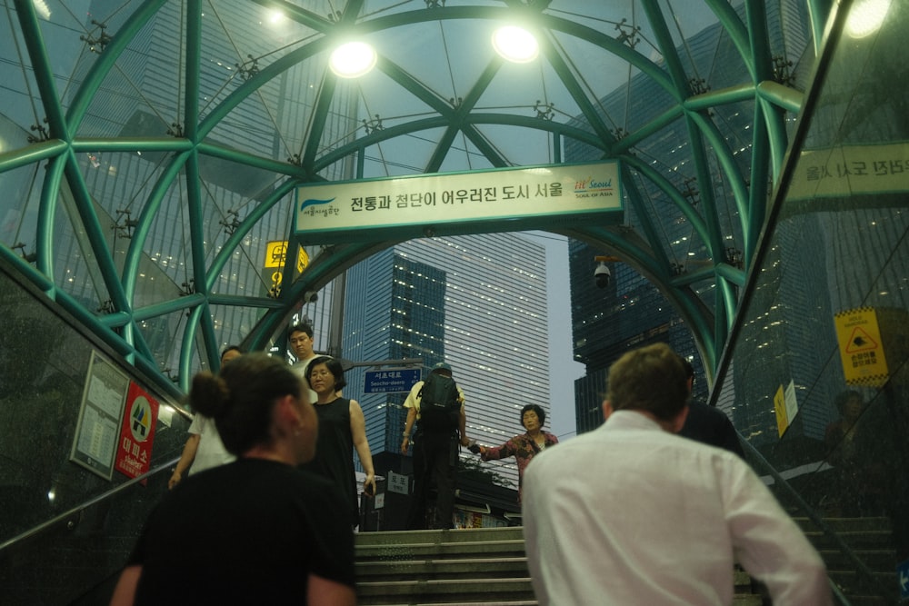 a group of people walking down a flight of stairs