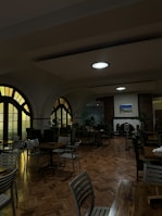 Cozy dining area glowing with soft lighting where guests enjoy their meals.