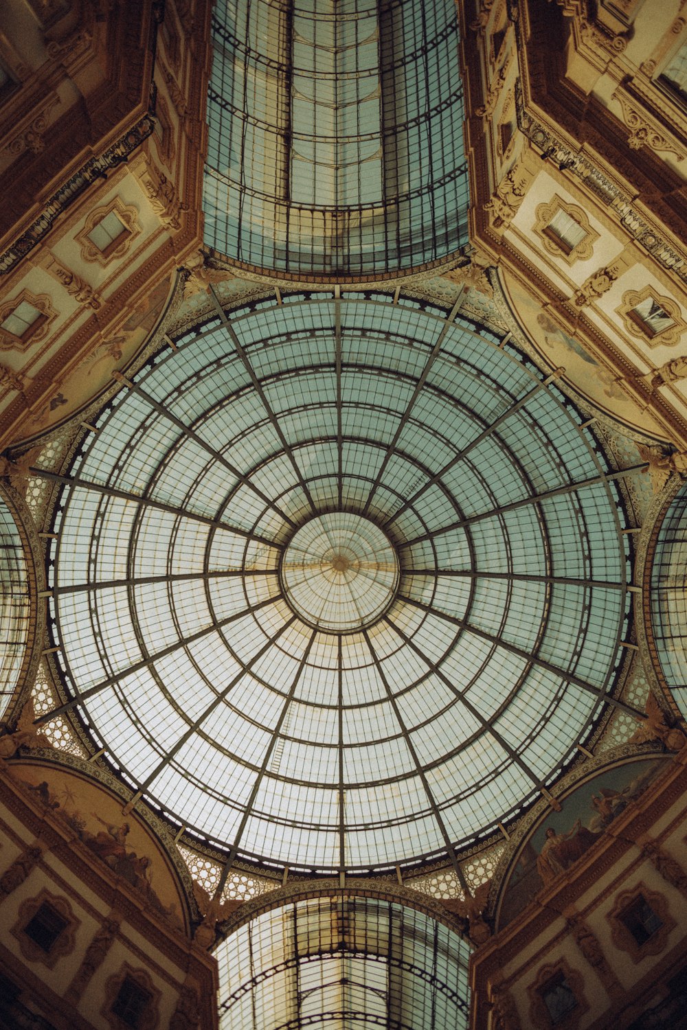 the ceiling of a building with a glass dome