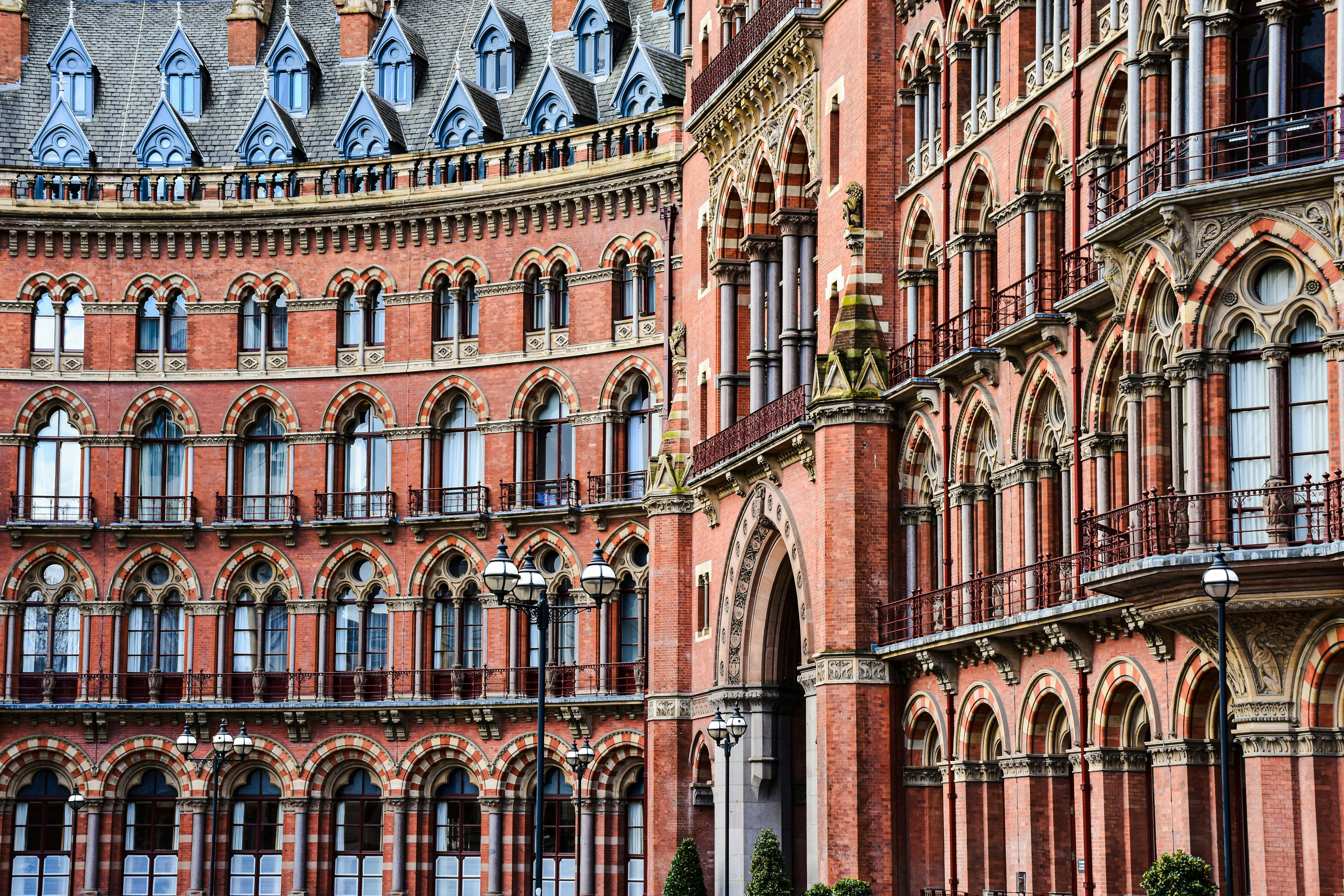 a large red brick building with many windows