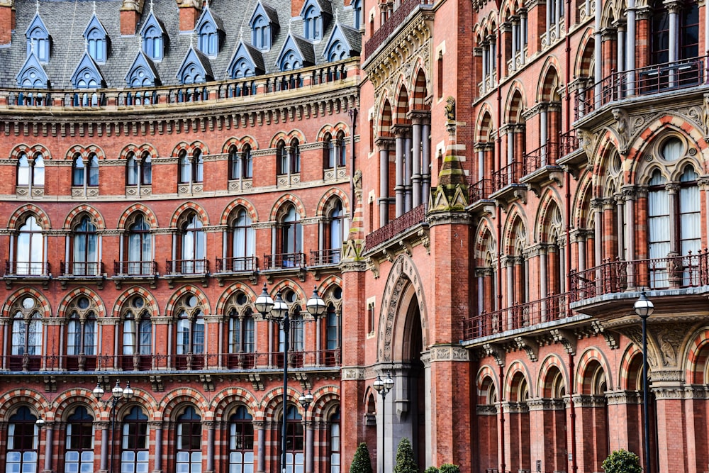 a large red brick building with many windows