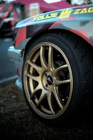 Close-up of a detailed car decal design in bright colors on a Forza game car.