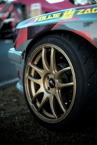 Close-up of a detailed car decal design in bright colors on a Forza game car.