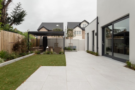 a house with a large yard and a covered patio