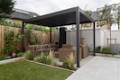 a patio with a couch and a table in it