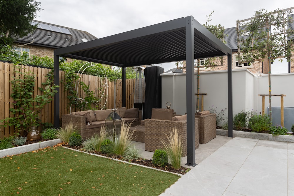 a patio with a couch and a table in it