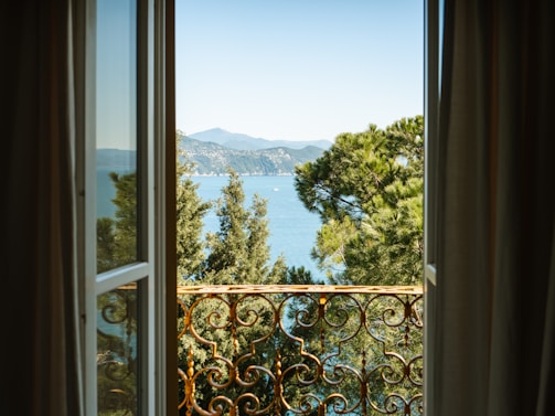 An elegant window view overlooking a scenic landscape.