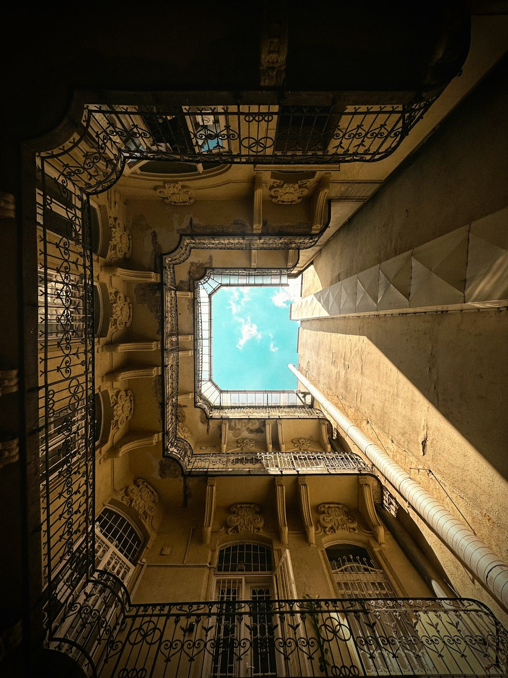 looking up at the ceiling of a building