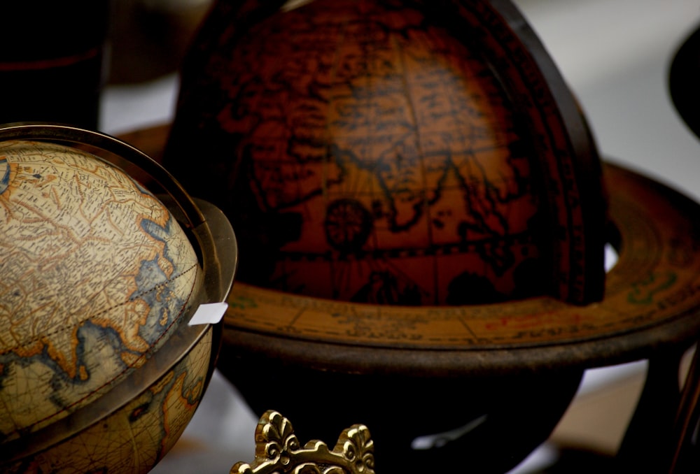 a group of globes sitting on top of a table
