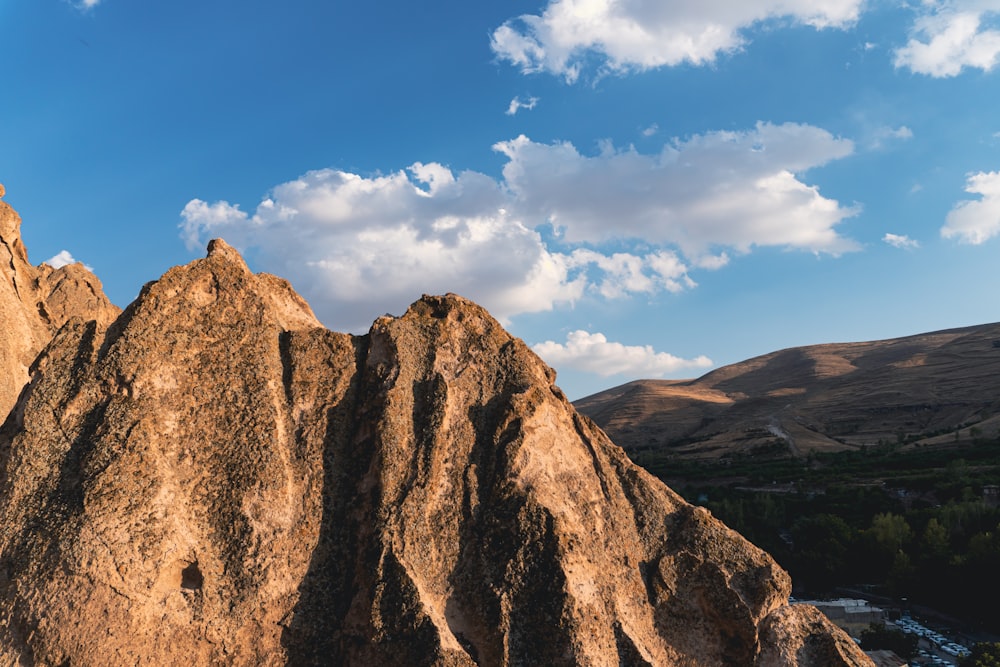 a view of a mountain range with a river below