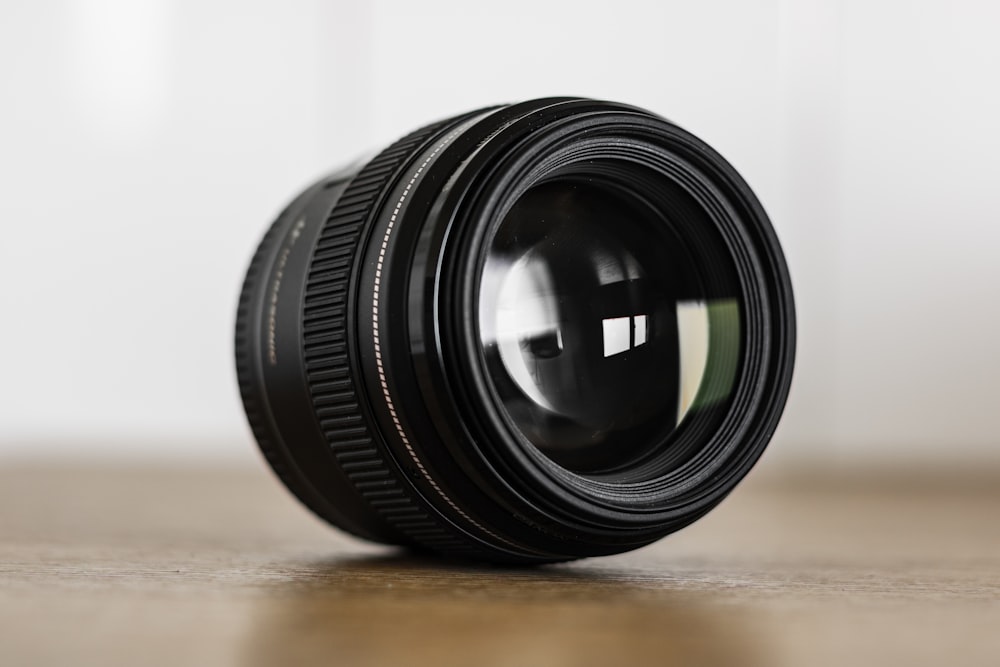 a close up of a camera lens on a table