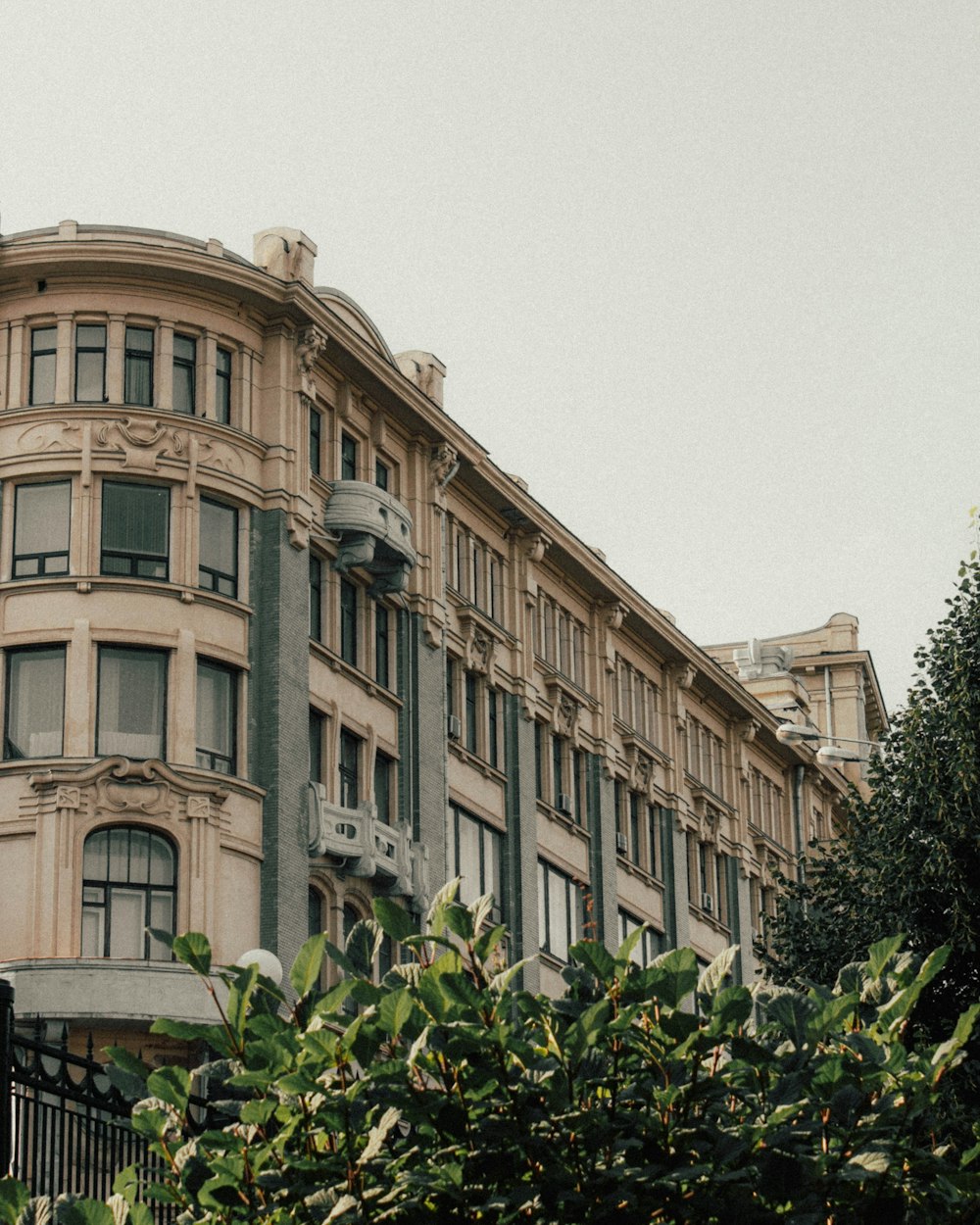 a tall building with a clock on the top of it