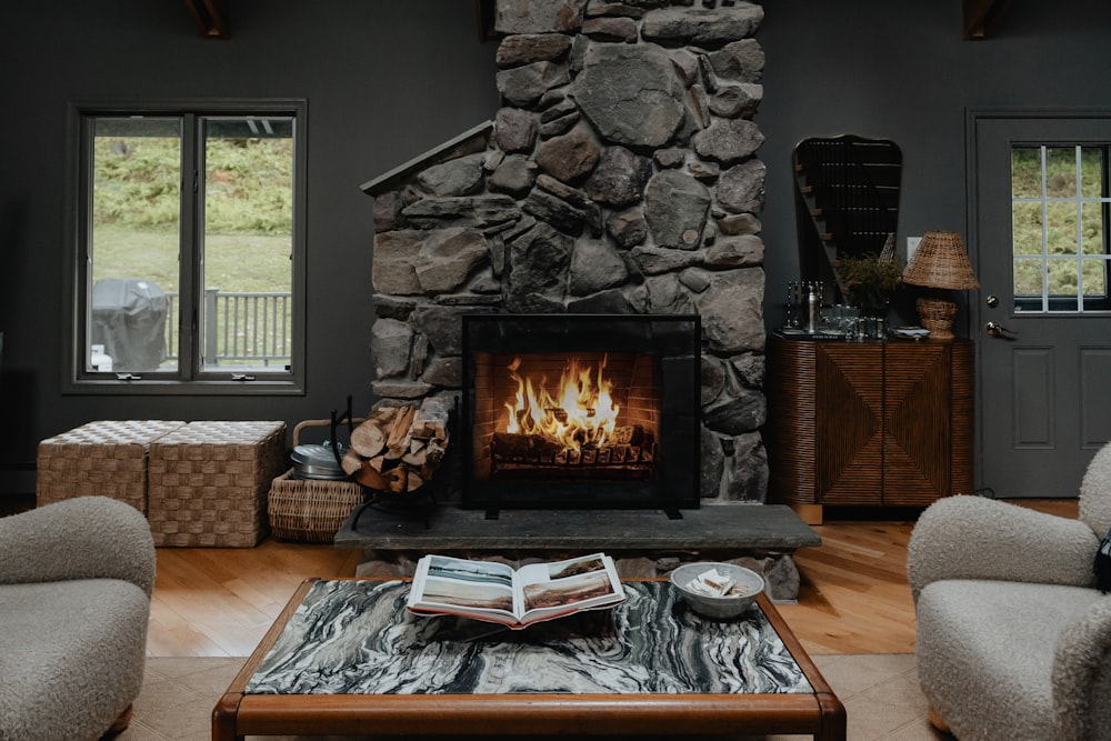 a living room filled with furniture and a fire place