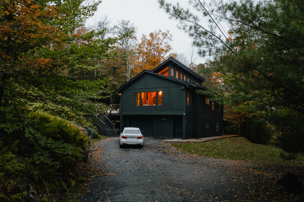 a car is parked in front of a house