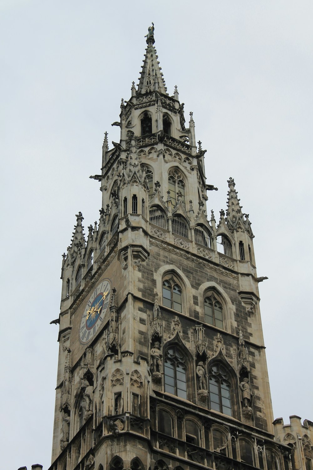 a very tall building with a clock on it's side