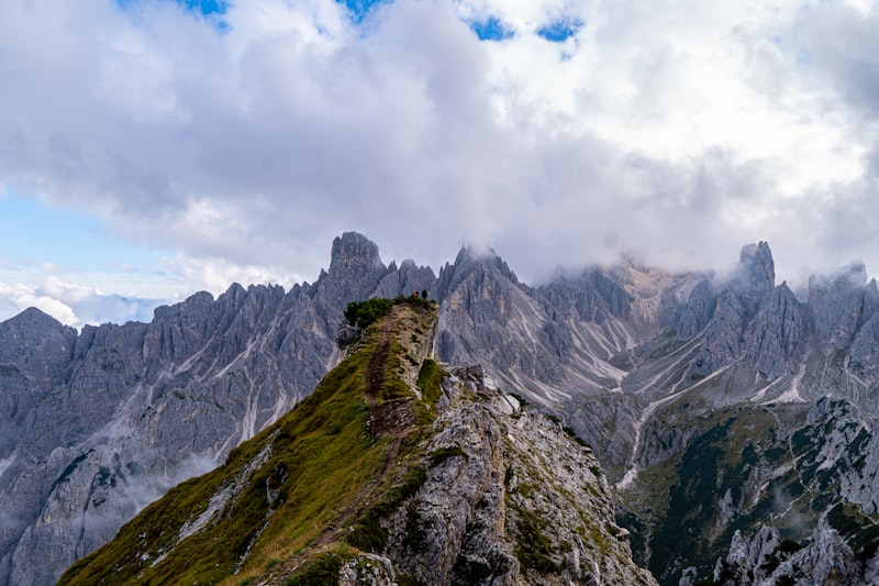 Elegant building perched on a cliff in the Italian Alps
