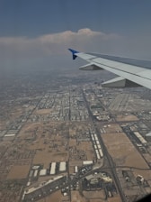 A detailed aerial view of a cityscape showcasing digital orthophotos overlaid with precise geospatial data.