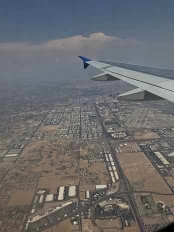 A detailed aerial view of a cityscape showcasing digital orthophotos overlaid with precise geospatial data.