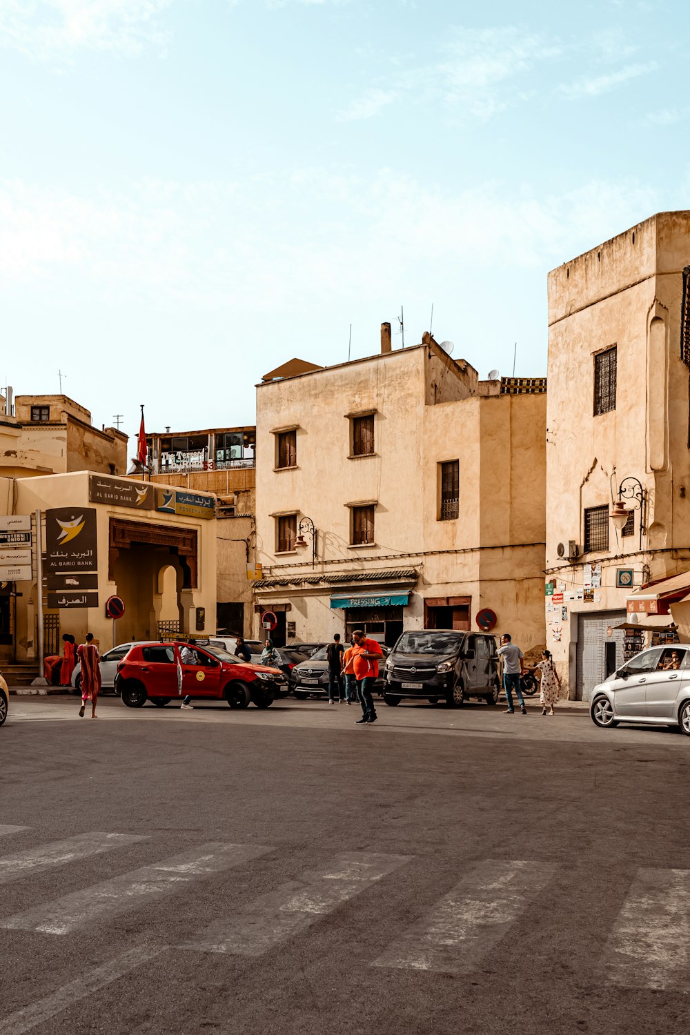 a group of cars parked on the side of a road