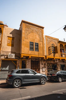 a car is parked in front of a building